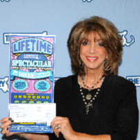 The woman became a lifetime lottery winner in Massachusetts Lottery